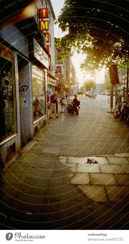 20259_HHH Sunset Snack bar Puddle Dark Light End of the film Original Traffic infrastructure Hamburg Street easter shade shadows Contrast Bright