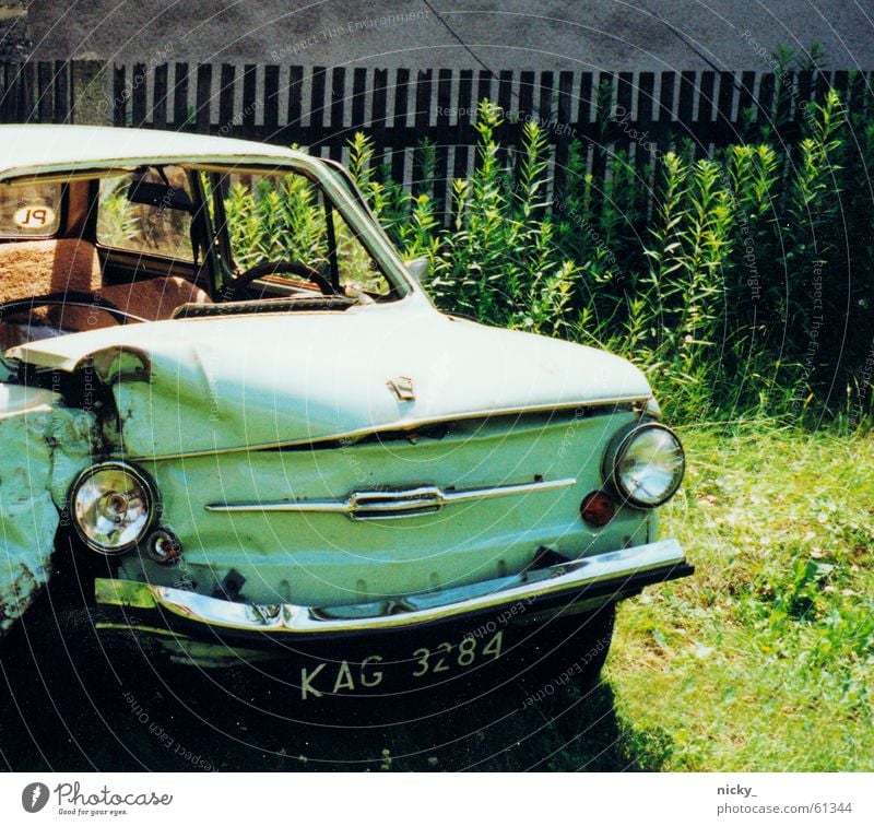 The man is stupid, the car rocks. Broken Turquoise Meadow Wall (building) Scrap metal blah-blah Car my 342 same pictures Garden Lawn beautiful teeth