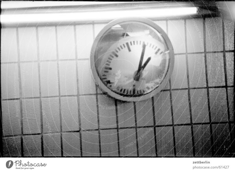 watch comparison Clock Time Alexanderplatz Reflection Neon light Subsoil Checkered Cold Empty Speed Calm Past Commuter Light Transport Historic Nostalgia Dirty