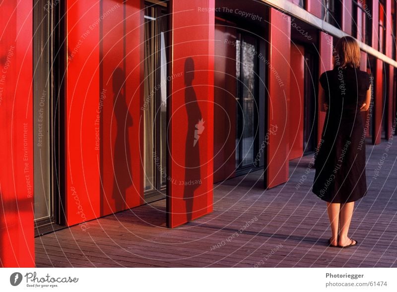 Me, myself and I Munich Evening sun Red Rear view Plate with holes Town house (Terraced house) Residential accommodation Human being Shadow student complex