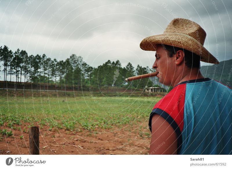 Big Cigar Cuba Valle de Viñales Man Macho Havana Red impressed Hat Smoking Smoke Blue