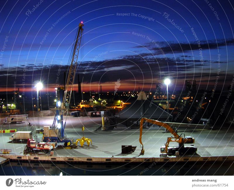 Evening atmosphere at the harbour II Excavator Ocean Jetty Twilight Closing time Port Sky Sunset Crane Light Work and employment Harbour Industrial Photography