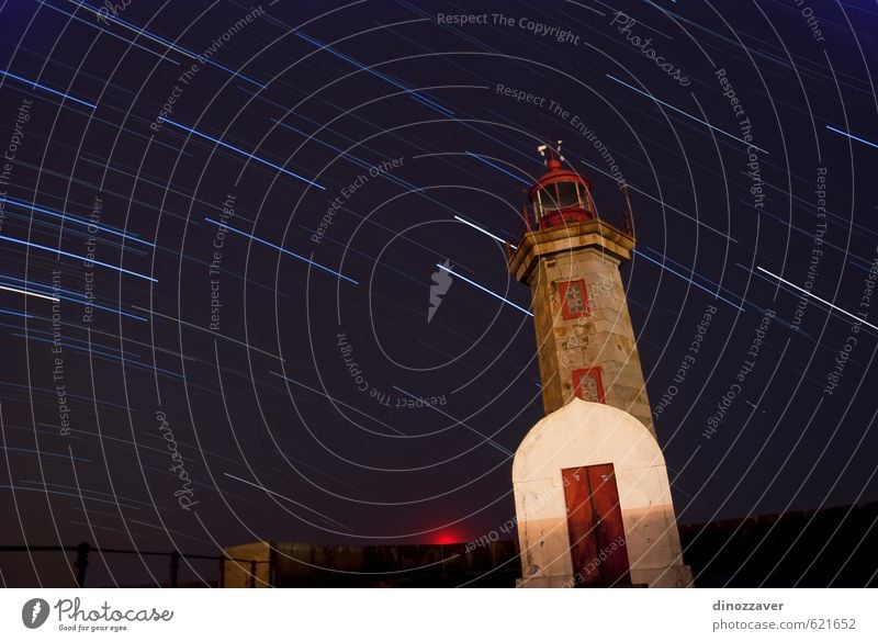 Lighthouse with startails Vacation & Travel Summer Beach Ocean Sky Clouds Rock Coast Building Architecture Dark Bright Blue Safety Safety (feeling of) Romance