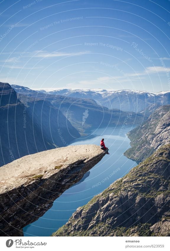 Man sitting on the Trolltunga in Norway Joy Calm Vacation & Travel Tourism Adventure Far-off places Freedom Summer Mountain Hiking Climbing Mountaineering