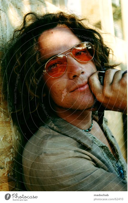 POET | portrait male man hippie festival boy dream type single Portrait photograph Man Sunglasses Hippie Freak Dreamily Hand Long-haired Dirty Looking