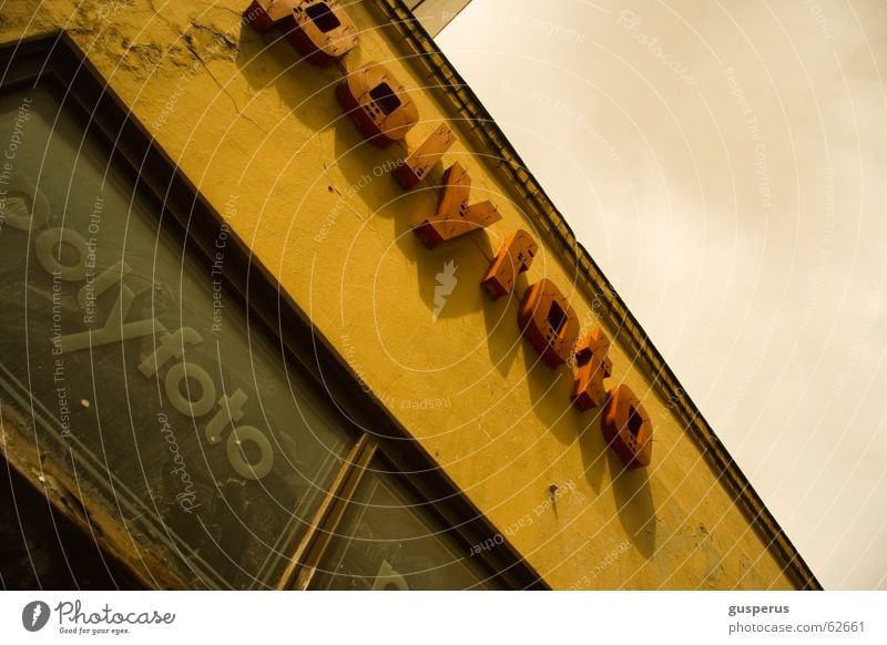 ostlook!!! House (Residential Structure) East Film Yellowed Old fashioned Advertising Neon sign Nostalgia for former East Germany Leipzig polyphoto orwhere