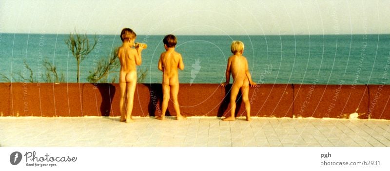 Do you want a Campari? Ocean Sunset Boy (child) Naked Child terrace Sky Back