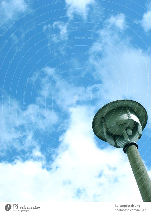 Streetlight in Berlin East Street lighting Clouds Lamp Summer Strange GDR Sky berlin east Cool (slang) Fantastic Electricity pylon Perspective