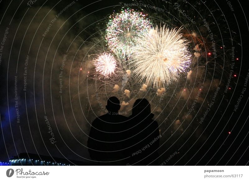 Magic moment Colour photo Exterior shot Light Human being Friendship Couple Skyline Smoke Glittering Illuminate Looking Esthetic Dark Elegant Fantastic