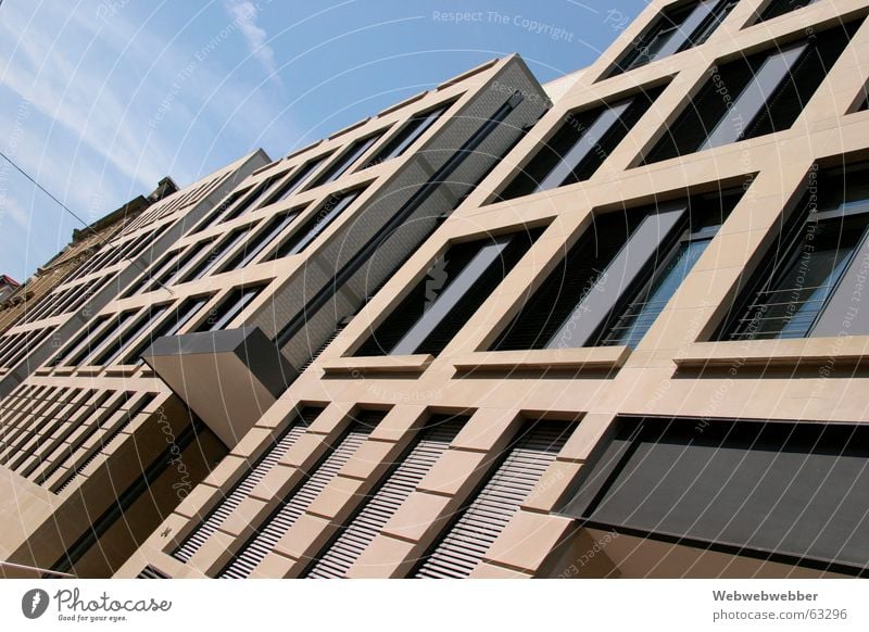 Publishing building in Stuttgart Facade Exterior shot facade building building windows topple topple office city work business beige