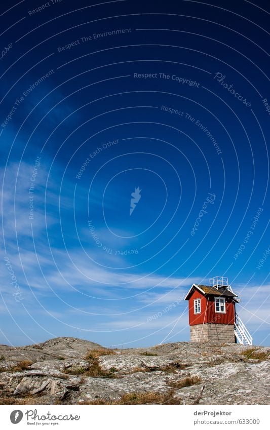 Red little house on stone before blue sky Environment Landscape Summer Hill Rock Baltic Sea Island House (Residential Structure) Dream house Hut