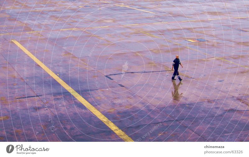 walking after the rain Men step alone reflection.