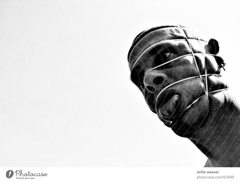 CAPTURE 1. Whimsical Rubber Bald or shaved head Looking Designer stubble Bound Trashy Elastic band Earring Face ahhh Wrinkles tied Black & white photo