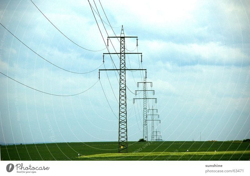 under current Electricity Electricity pylon Clouds Field Nature Sky Cable Metal Deep