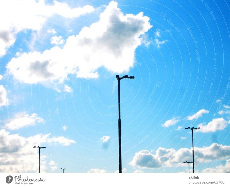 Lantern, lantern, sun, moon and stars Light Clouds Street lighting Parking lot lighting Floodlight Places Sky Lighting Structures and shapes Tall Blue