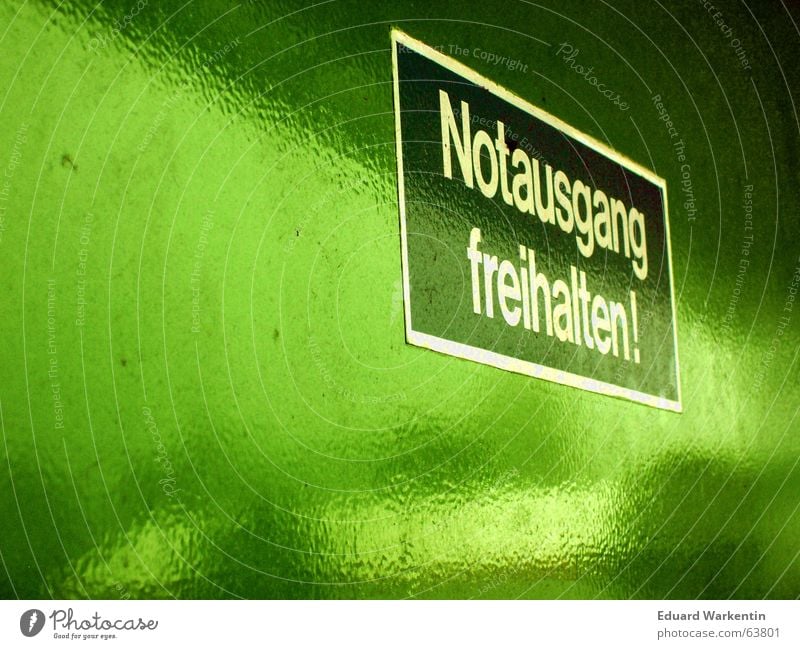 Keep the emergency exit clear! Emergency exit Green Invite Unload Home improvement store Parking lot Sunday Command keep Door Signs and labeling Information