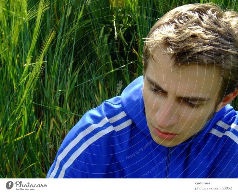 I'm just taking a break... Man Jacket Break Hooded jacket Portrait photograph Fatigue Grass Field Calm Think Summer Emotions Green Human being Face