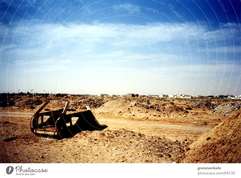 Car in the desert sand Colour photo Exterior shot Deserted Sand Rust Poverty Scrap metal Nouakchott Africa Mauretania Sahara Garbage dump Waste management