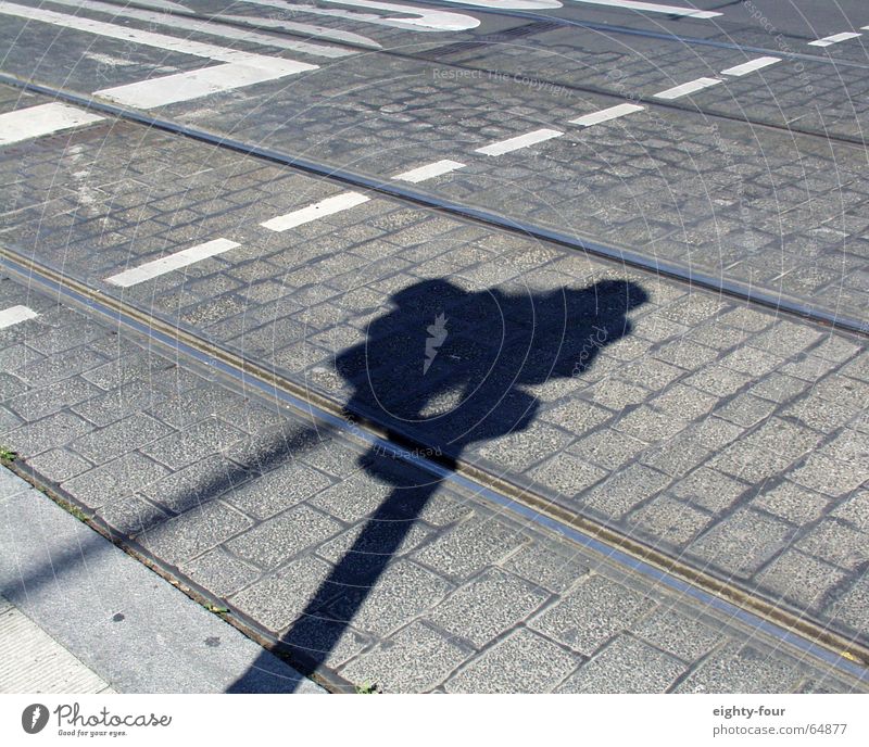 track_study_08 Asphalt Concrete Railroad tracks Tram Driving Transport Gray Curbside Traffic light Street Cobblestones Shadow eighty-four Lane markings