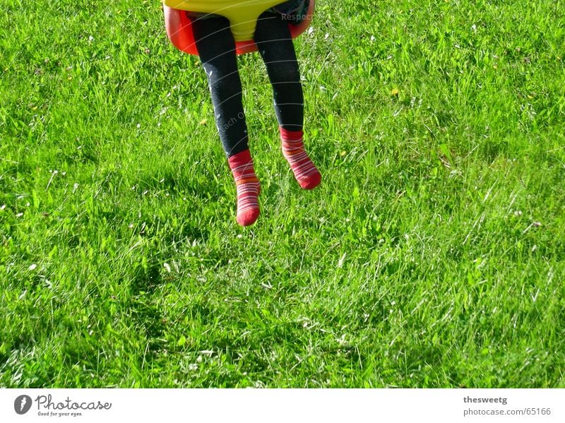 taken for a ride Playground Child Swing Girl Boy (child) Childlike Spirited Aloof Airy huitschn Legs Lawn Wing romping place child's swing Bump Driving