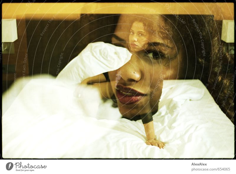 analog double exposure of young beautiful dark skinned woman on a hotel bed Bed Hotel room Young woman Youth (Young adults) Face 18 - 30 years Adults Dress