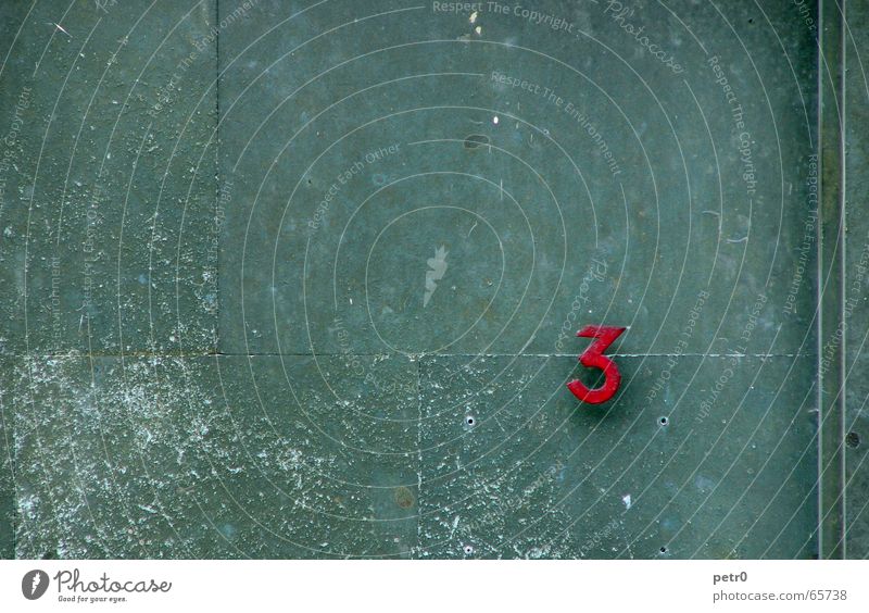 Three Wall (building) 3 Green Red Digits and numbers House number Facade Patina Scratch mark Borehole Dirty Stone Detail Street Derelict Seam Line