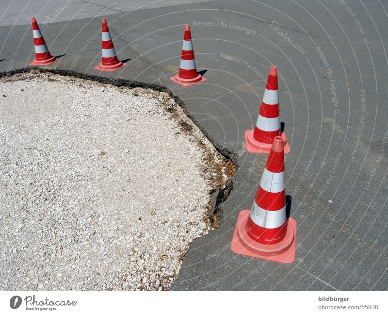 Attention in traffic! Street sign Road sign Stand Beaded Transport Detour Hat Traffic accident Asphalt Gravel Hard Broken Pothole Torn Striped Reddish white