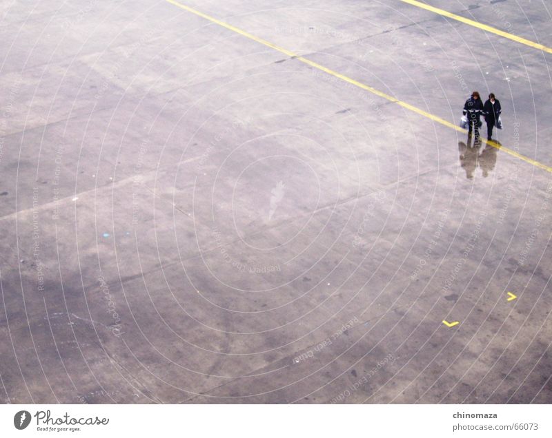 Water Reflection Human being Dance floor Yellow Lady rain water lines two