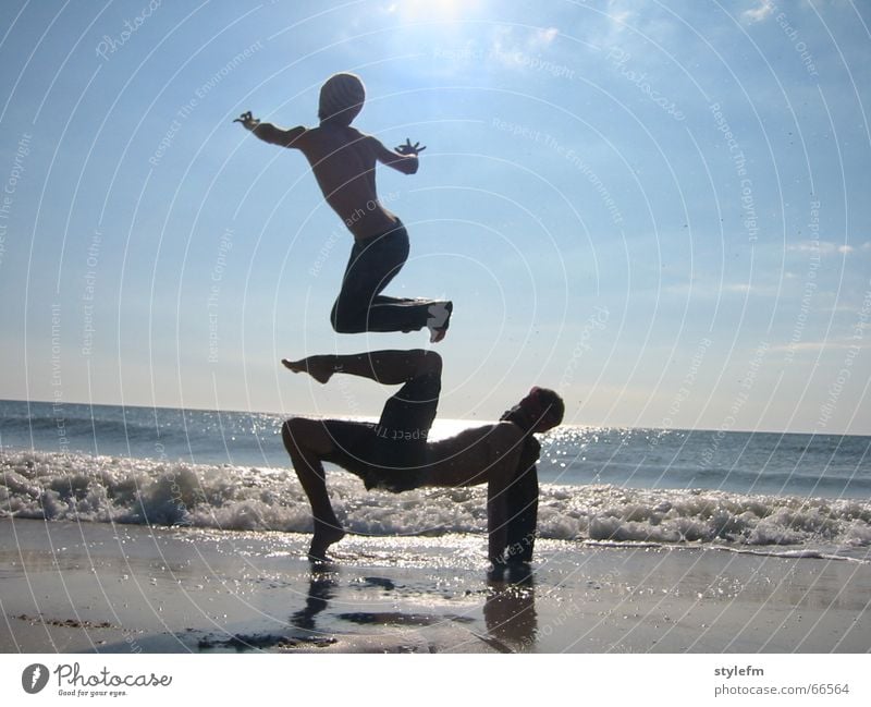 parallel world Beach Damp Wet Hot Ocean Far-off places Jump Gymnastics Hop Acrobatics Waves Foam Clouds Beautiful Fluffy Playing Vacation & Travel