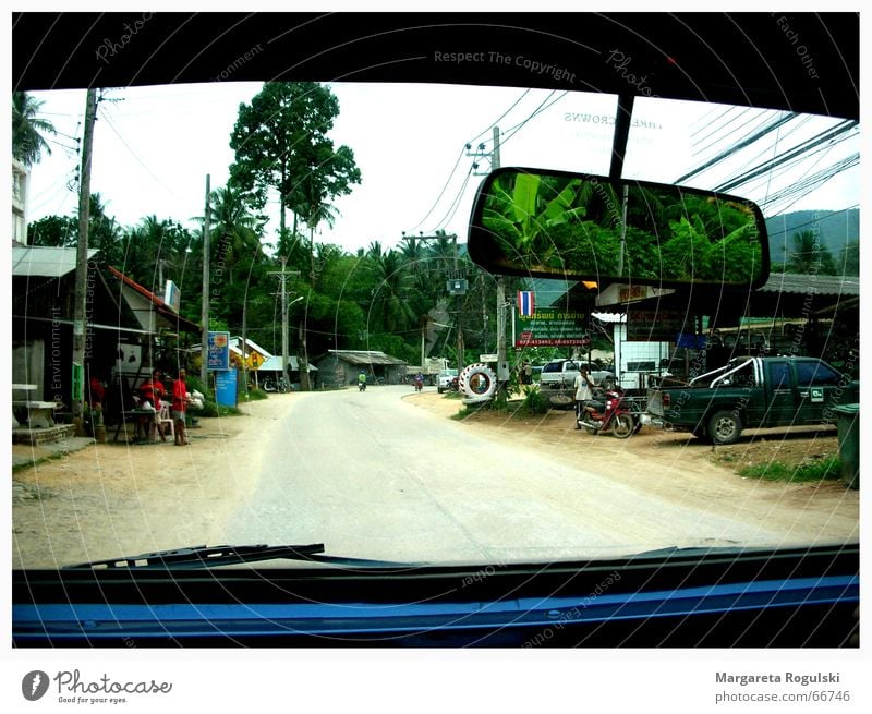 road trip Offroad vehicle Thailand Mirror Palm tree Village Koh Samui Left-hand traffic Rear view mirror Car jeep Street Window pane Lanes & trails