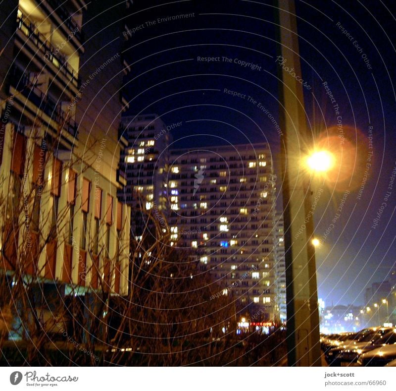 Frosty weather Night sky Winter Bushes Downtown Berlin Tower block Prefab construction Facade Car Cold Gloomy Moody Environment Vicinity GDR Colour defect