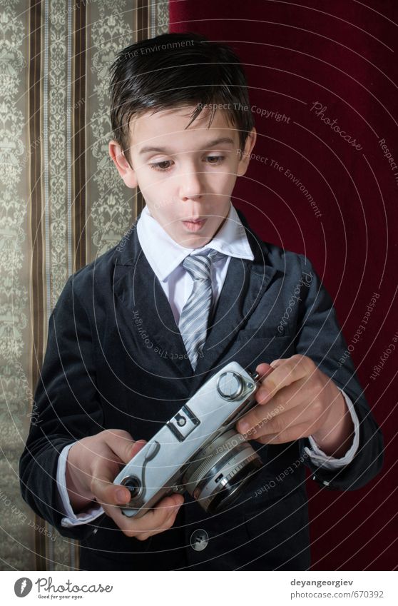 Boy with vintage camera Lifestyle Happy Child Camera Boy (child) Infancy Old Small Cute Retro White Nostalgia young Photography Caucasian Photographer kid