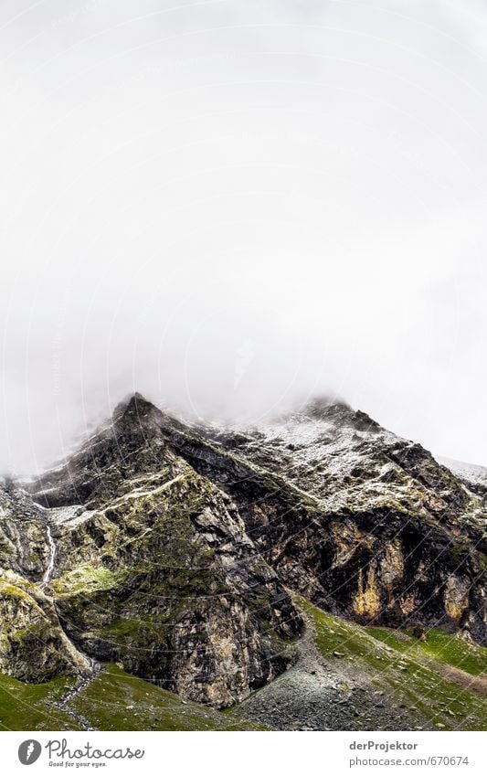 The mountain calls 03 Environment Nature Landscape Plant Elements Clouds Summer Climate Bad weather Snow Rock Alps Mountain Peak Snowcapped peak Esthetic Brown