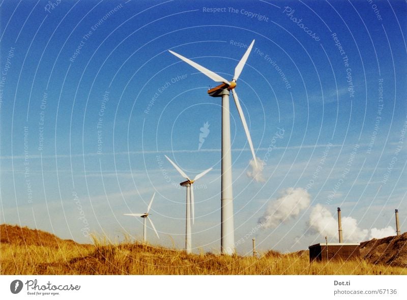 Wind turbines and smokestacks on the Dutch coast analogue Beach Factory Industry Energy industry Technology Advancement Future Renewable energy