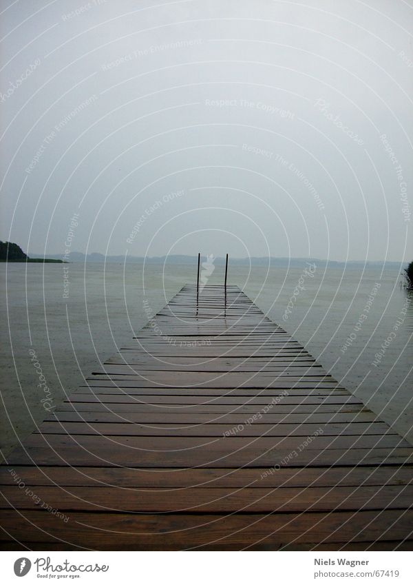 endless bridge Footbridge Lake Wood Bad weather Calm Water Rain Ladder Sky Clouds