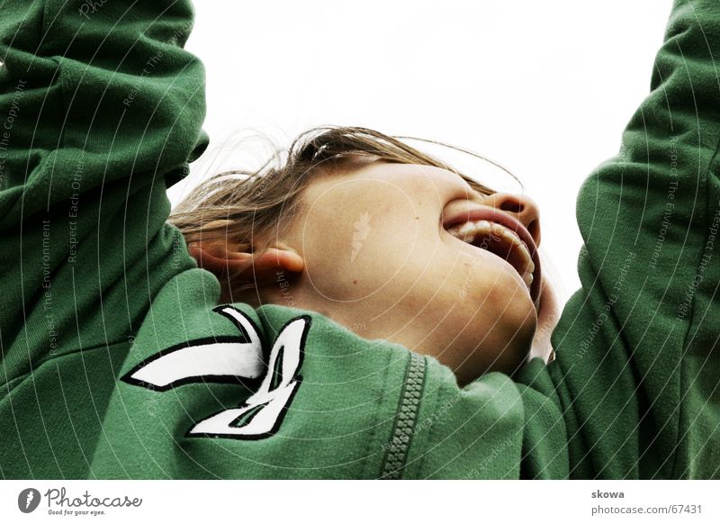 hang Hang Playground Worm's-eye view Green Child Blonde Jacket Playing climbing scaffold Joy Mouth Boy (child) Teeth