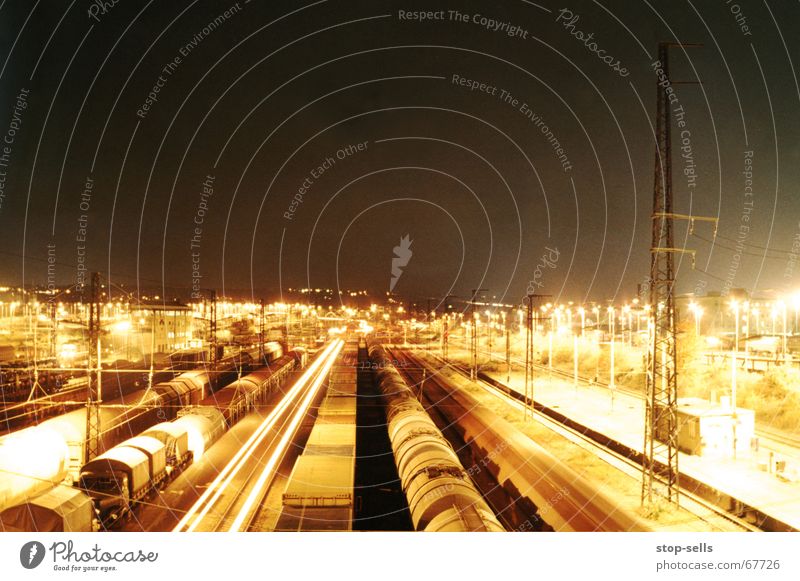 mystery train Freight car Night Dresden Long exposure Freight station Freight train Radiation Light Going Tracer path Railroad Train station city of peace