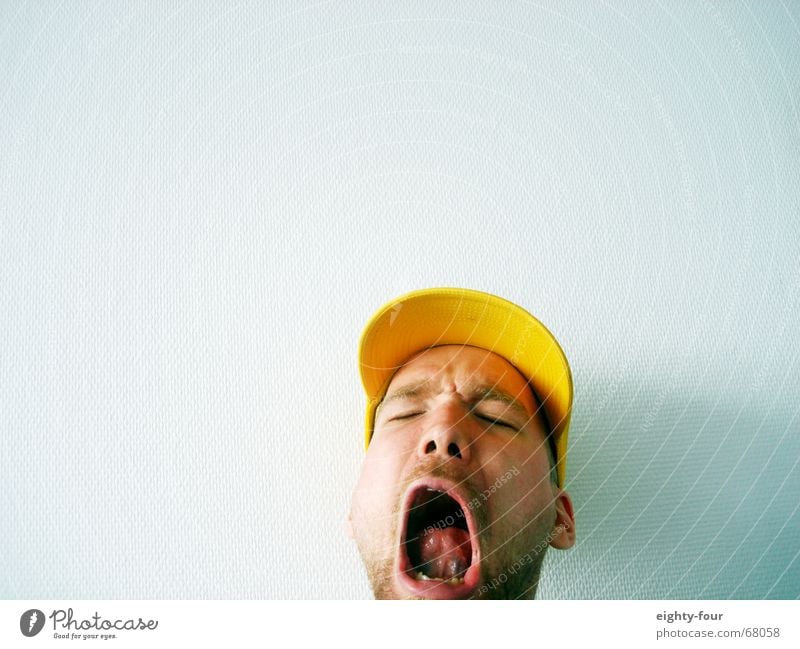 primal cry Grumble Face Hideous Cap Baseball cap White Wall (building) Portrait photograph Scream Cry Tongue circus face Mouth Head Partially visible