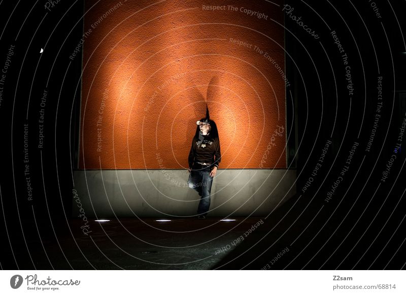 nocturnal meditation Man Light Stand Stage lighting Long exposure Posture Think contemplative Orange night portraits