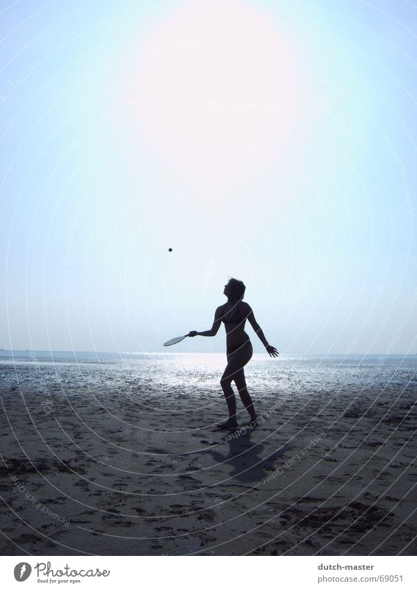 Beach fun #1 Netherlands Summer Slick Woman Light Dark Ocean Vacation & Travel Beach ball Playing Tennis Dazzle Movement Action Visual spectacle Bikini Sun Sand