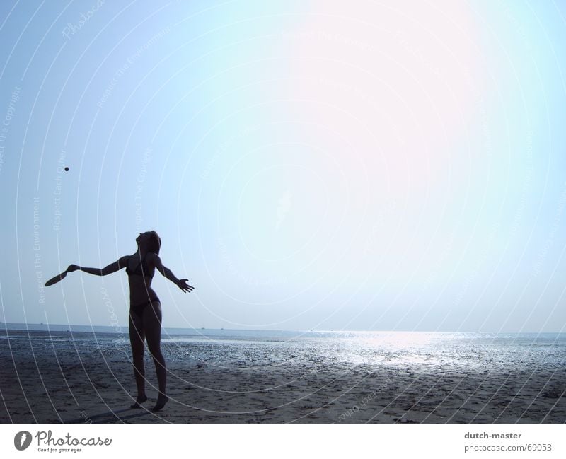 Beach fun #3 Netherlands Summer Slick Woman Light Dark Ocean Vacation & Travel Beach ball Playing Tennis Dazzle Movement Action Visual spectacle Bikini Sun Sand