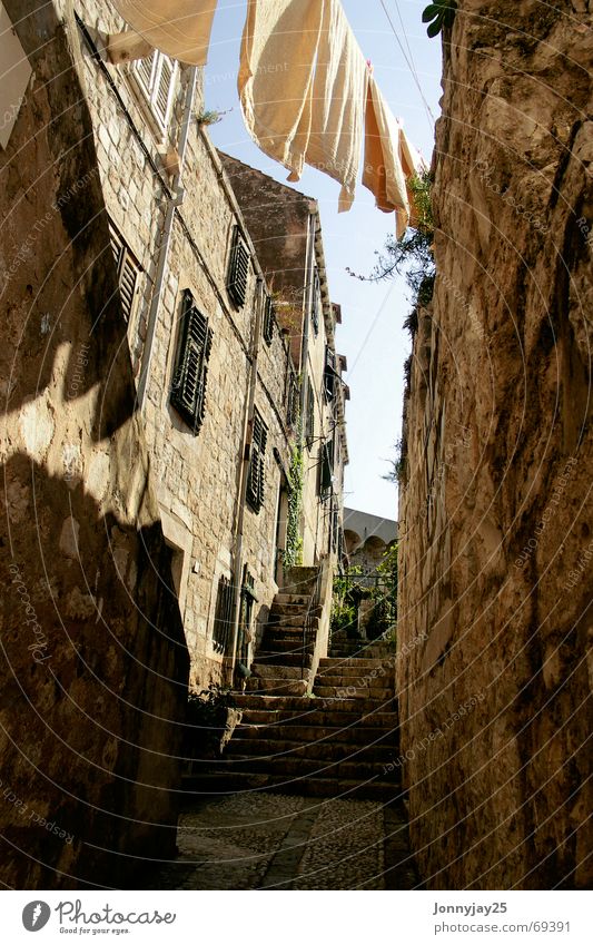 tumble dryers Croatia Dubrovnik Summer Physics Laundry Dry Towel Stone wall Warmth Stairs Upward Old