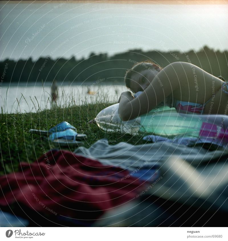 chill on sea Air mattress Clothing Woman Think Dream Relaxation Calm Serene Lake Summer Medium format Human being grass Lie