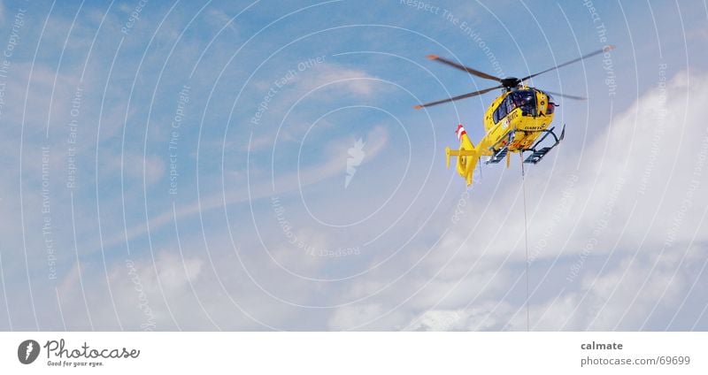 - Rescue flight - Helicopter Helper Hover Yellow rescue helicopter Sky rescue flight Search rescue rope Flying Eurocopter ec135