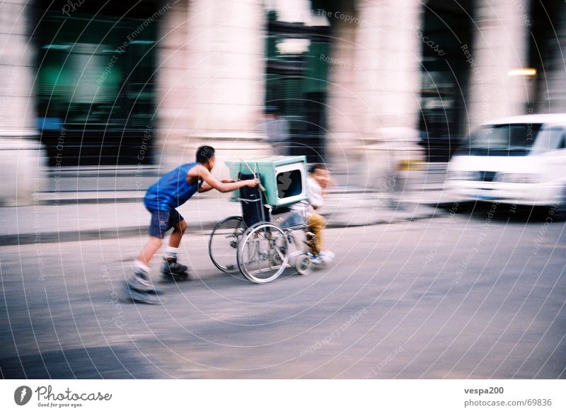 wheelchair race Cuba Wheelchair Inline skating Friendship Asphalt Speed Havana Running fun Joy Logistics Street