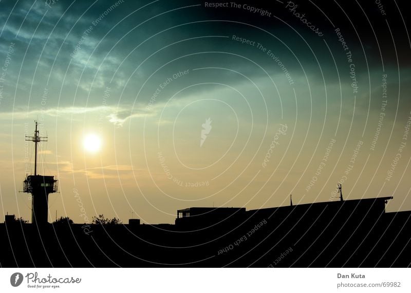 At the end of the horizon Dark Threat Ominous Watercraft Back-light Sunset Black Yellow Wangerooge Deserted Aircraft carrier Horizon Clouds Transience Sky Tower