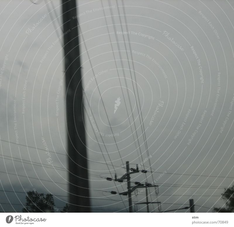 lot 11 Telegraph pole Electricity pylon Gray Fog Speed Highway Grow hazy Dream Wet Grief Landscape Street Vacation & Travel Rain poor visibility pass Blur