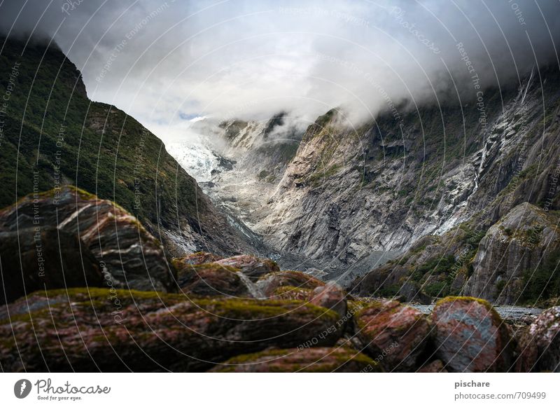 Emperor Franz Josef Nature Landscape Bad weather Rock Alps Mountain Snowcapped peak Glacier Dark Sharp-edged Adventure New Zealand french josef Colour photo