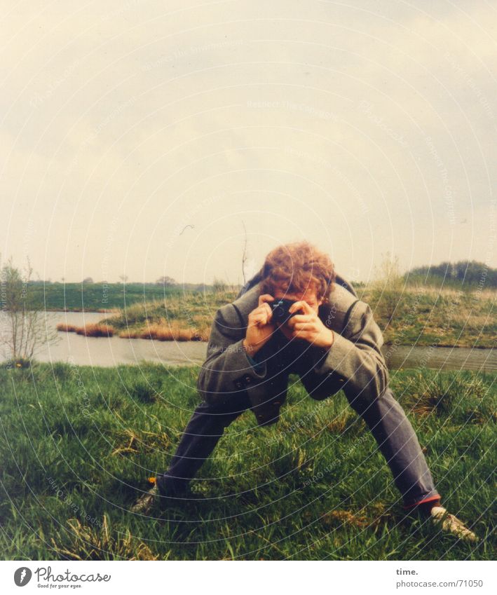 Highnoon light Colour photo Exterior shot Landscape Water Sky Clouds Bad weather Meadow Hill Jacket Observe Stand Study Crooked Unhealthy Former Posture