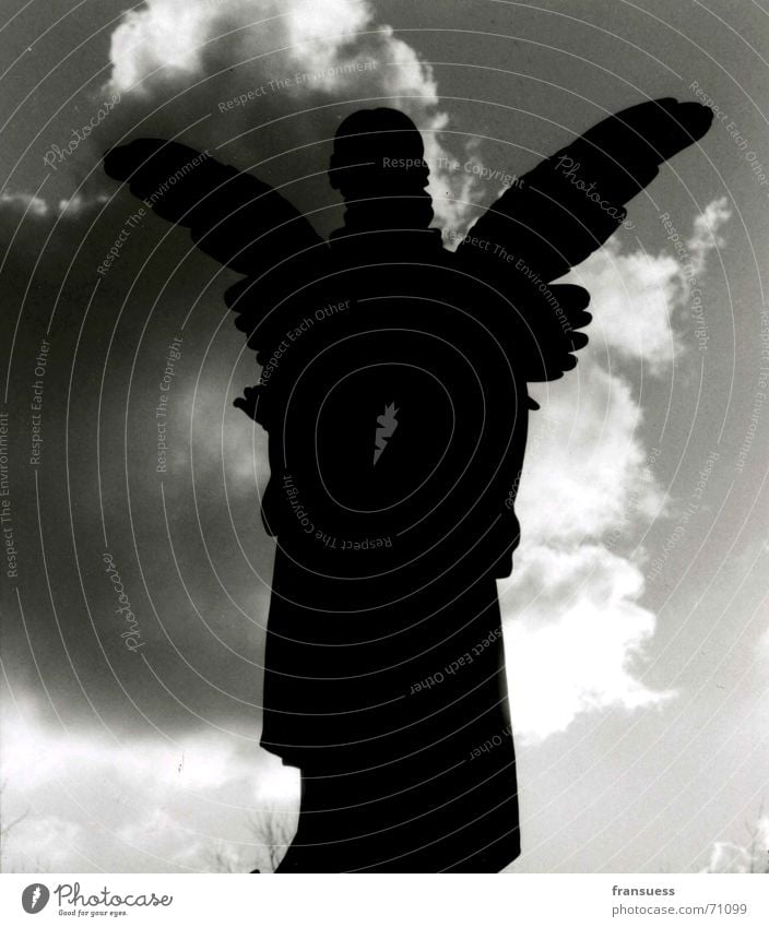 "I will escort you" Silhouette Back-light Clouds Threat Cemetery Munich Bible Deities Jesus Christ Angel Black & white photo Peaceful east cemetery Wing God